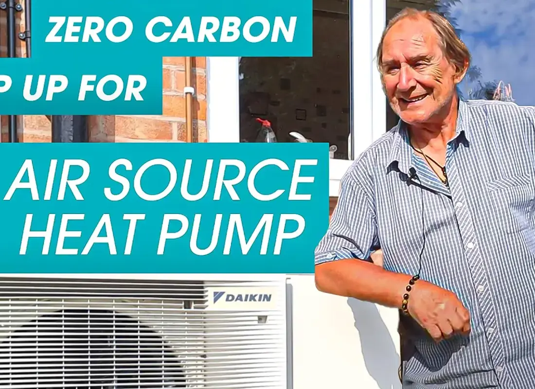 zero carbon air source heat pump thumbnail with dave lee leaning on his pump
