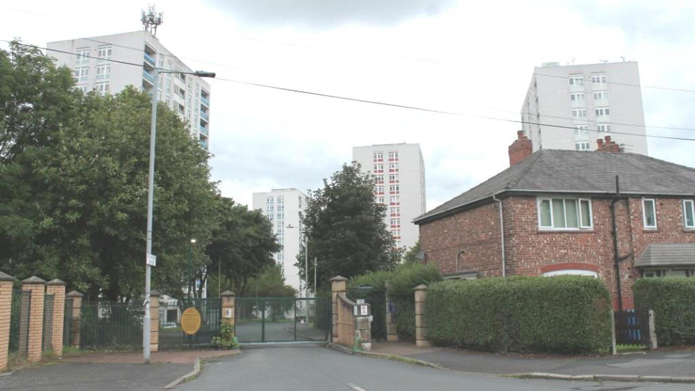 an external image of four high rise blocks of flats in north manchester