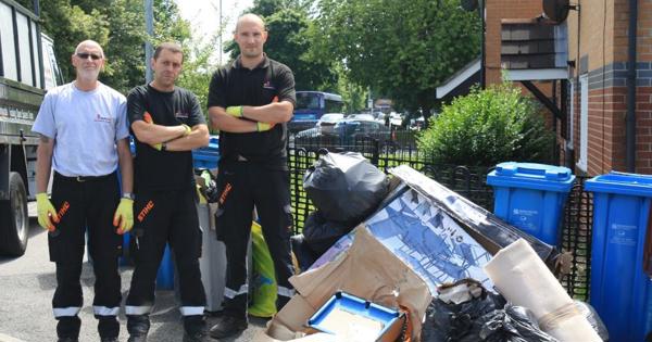 three of the open spaces team with some dumped rubbish in monsall