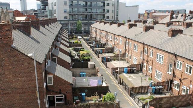 an aerial shot of the back yards of Anita Street in Ancoats