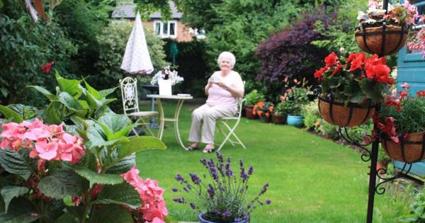 Norma Ogden Having A Drink In Her Garden On Warbeck Road